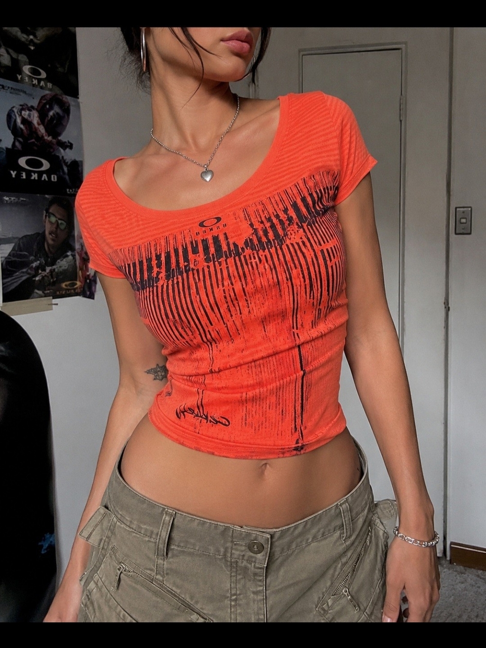 “Y2K Oakley neon coral graphic athletic tee | sporty mcbling athleisure top”